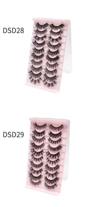 Detail view of DSD28 and DSD29 thick false eyelashes sets with 10 pairs on pink stands
