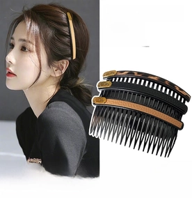 Detailed view of three hair side combs featuring leopard print and leather textures
