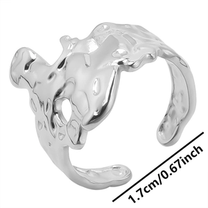 Detail showing 1.7cm inner diameter of an irregular textured stainless steel ring