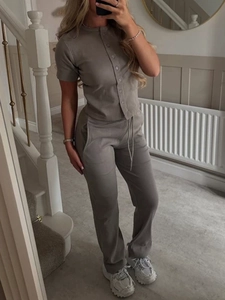 Short sleeve button-up top and matching long pants in light taupe casual set