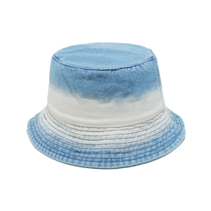 Detail of gradient blue and white denim bucket hat showing reinforced brim stitching