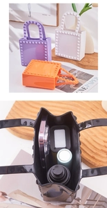 Detail of studded PVC jelly handbags in multiple colors and spacious interior view