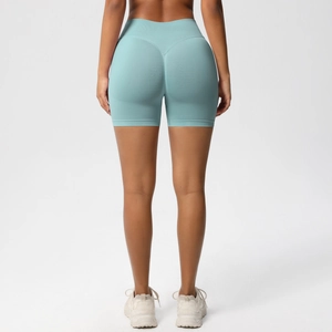 Detail view of seamless aqua blue high waisted yoga shorts with scrunch butt texture