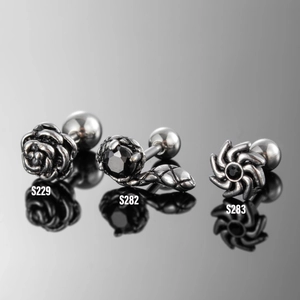 Men's stainless steel stud earrings set featuring rose, black stone, and sun swirl designs