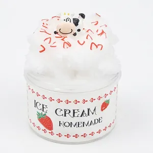 DIY Strawberry Slime Toy with Cartoon Cow Doll and Strawberry Slices in a Plastic Jar