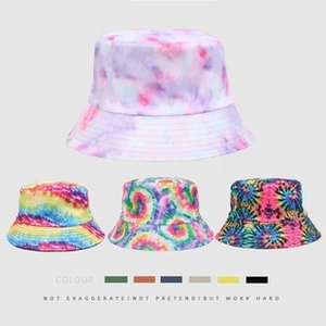 Detail showing various tie-dye patterns and colors for the hip-hop cotton bucket hat