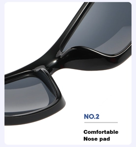 Detailed close-up of the comfortable integrated nose pad on glossy black star sunglasses