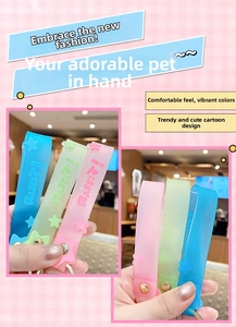 Close-up of pink, green, and blue cartoon silicone lanyards with star patterns and lettering