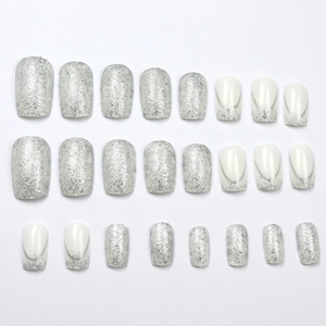 Elegant 24-piece press-on nail kit featuring silver glitter and French white tips