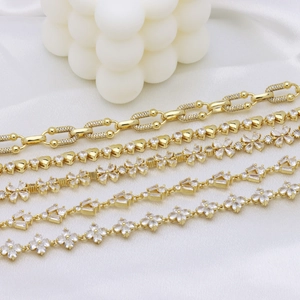 Elegant gold plated necklaces with heart and flower pendants inlaid with clear zircons