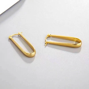 Polished 18K gold-plated U-shaped drop earrings with a minimalist teardrop design