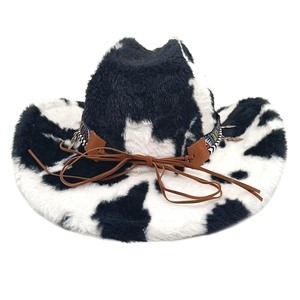 Detailed plush cow print cowboy hat with ethnic style ribbon and brown suede bow
