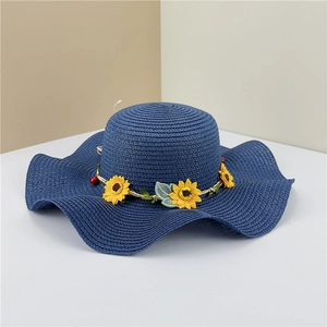 Dark blue wide brim woven straw hat with sunflower band for summer beach sun protection