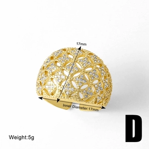 Detailed view of gold hollow heart ring with cubic zirconia showing 17mm inner diameter