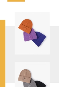 Vertical collage of colorful ribbed knit beanies with matching embroidered smiley faces