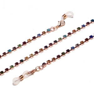 Detail of rose gold non-slip eyewear chain with colorful rhinestones and rubber loops