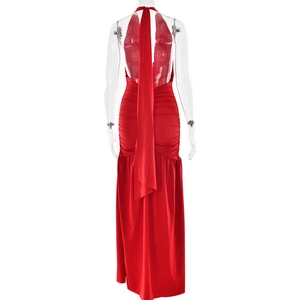 Back view of red halter backless dress with elegant draped fabric and pleat details