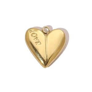 Detailed view of a gold heart pendant with LOVE engraving and polished finish