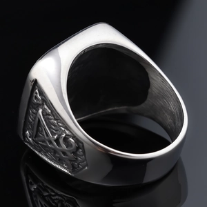 Detailed macro view of the vintage gothic ring featuring intricate dark mystic symbols