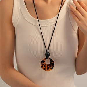 Retro acrylic leopard print geometric ring necklace with long minimalist black rope cord