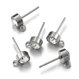 Detailed view of silver stainless steel earring posts with clear zircons and DIY hanging loops