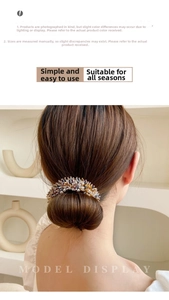 Detail view of handmade blue and amber crystal beads on a stylish hair comb for bun hairstyles