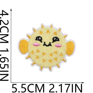Detail of yellow puffer fish embroidery patch with precise size measurements