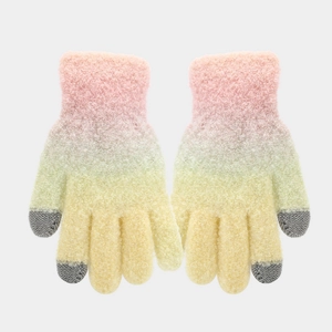 Detailed macro view of pink and green gradient knit gloves with touch screen fingertips