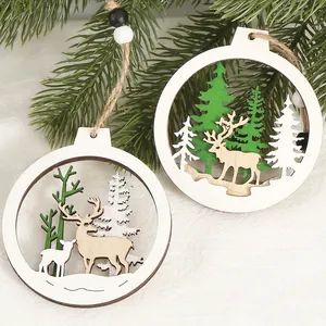 Set of two hollow wooden Christmas ornaments with reindeer and tree laser-cut designs