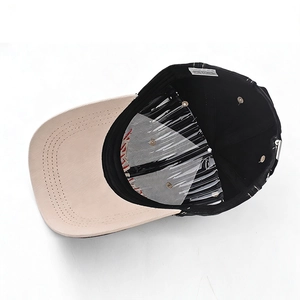 Interior detail of a cotton baseball cap with sweatband, wash label and adjustable buckle