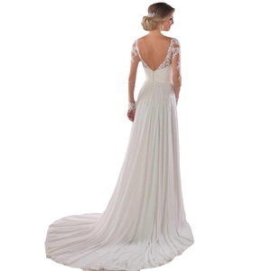 Elegant white long sleeve bridal gown with deep V-back lace detail and chapel train
