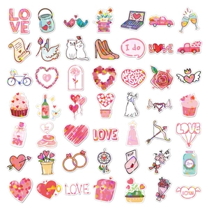 Detail of holographic Valentine heart stickers with Love and RSVP lettering for DIY crafts