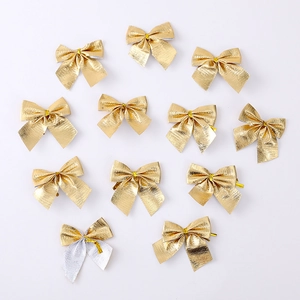 Set of 12 festive velvet Christmas tree bow ornaments in metallic gold and silver