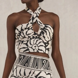 Women's halter crop top and skirt set with abstract black and white print