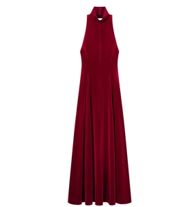 Detailed view of the dark red velvet fabric and halter neck design on this long dress