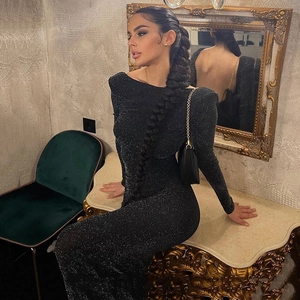 Sparkling black off-shoulder bodycon dress with open back and long sleeves for evening events