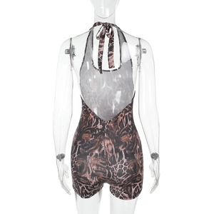 Back view of leopard print halter jumpsuit featuring a deep backless cut and slim fit