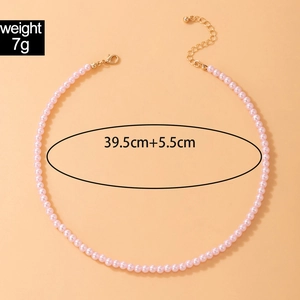 Detail of pink pearl necklace with golden lobster clasp, 39.5cm length and 7g weight