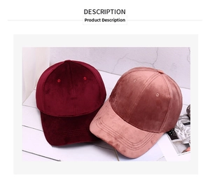 Close-up of velvet baseball caps in wine red and rose pink with soft texture
