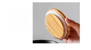 Detail of wooden lid with food-grade silicone sealing ring for airtight ceramic jar