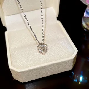 Cube pendant necklace with sparkling zircon in a premium cream jewelry gift box