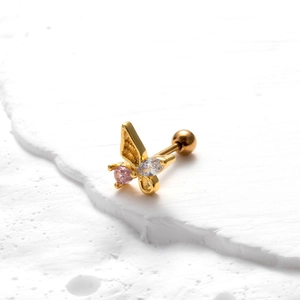 Golden butterfly screw back earring with pink and clear zircon on a stone base