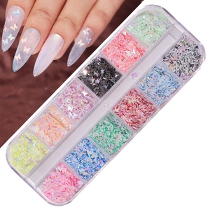 Close-up of 12-color laser butterfly nail sequins in a clear box with application detail