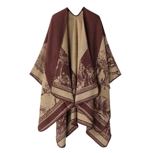 Detail of burgundy and khaki knit shawl showing intricate equestrian jacquard patterns
