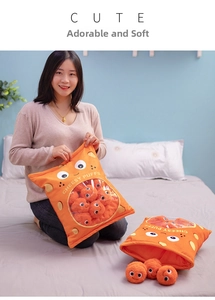 Detail of Cheesy Puffs plush snack pillow with cute orange plush balls and clear window
