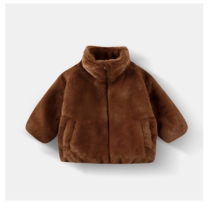 Close-up of children's faux fur jacket showing thick plush texture and stand collar