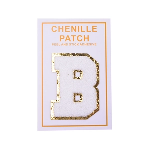 Detail of chenille letter B patch with gold glitter edge and peel and stick adhesive backing