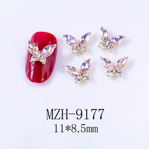 Detailed view of 11x8.5mm aurora purple butterfly nail charms with golden alloy frame