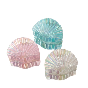 Three gradient shell hair claws in pink, blue and white with pearlescent finish