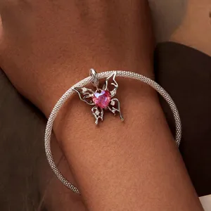 Romantic S925 sterling silver butterfly charm with pink heart gemstone on woven bracelet